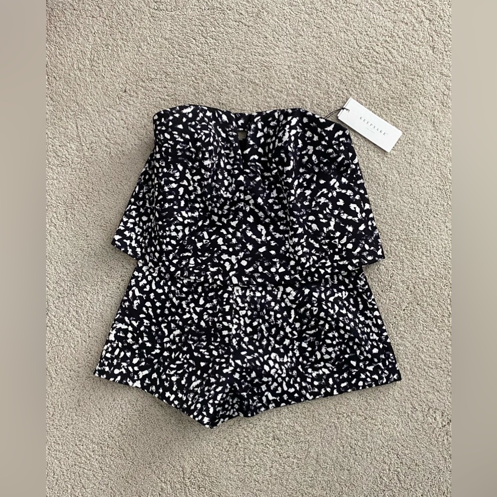 Keepsake brand one piece strapless romper. Designer evening wear.